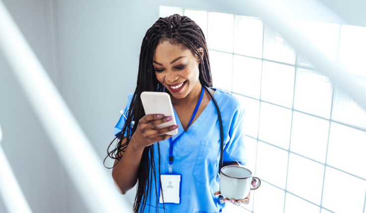 an employee read an annoucement on her phone