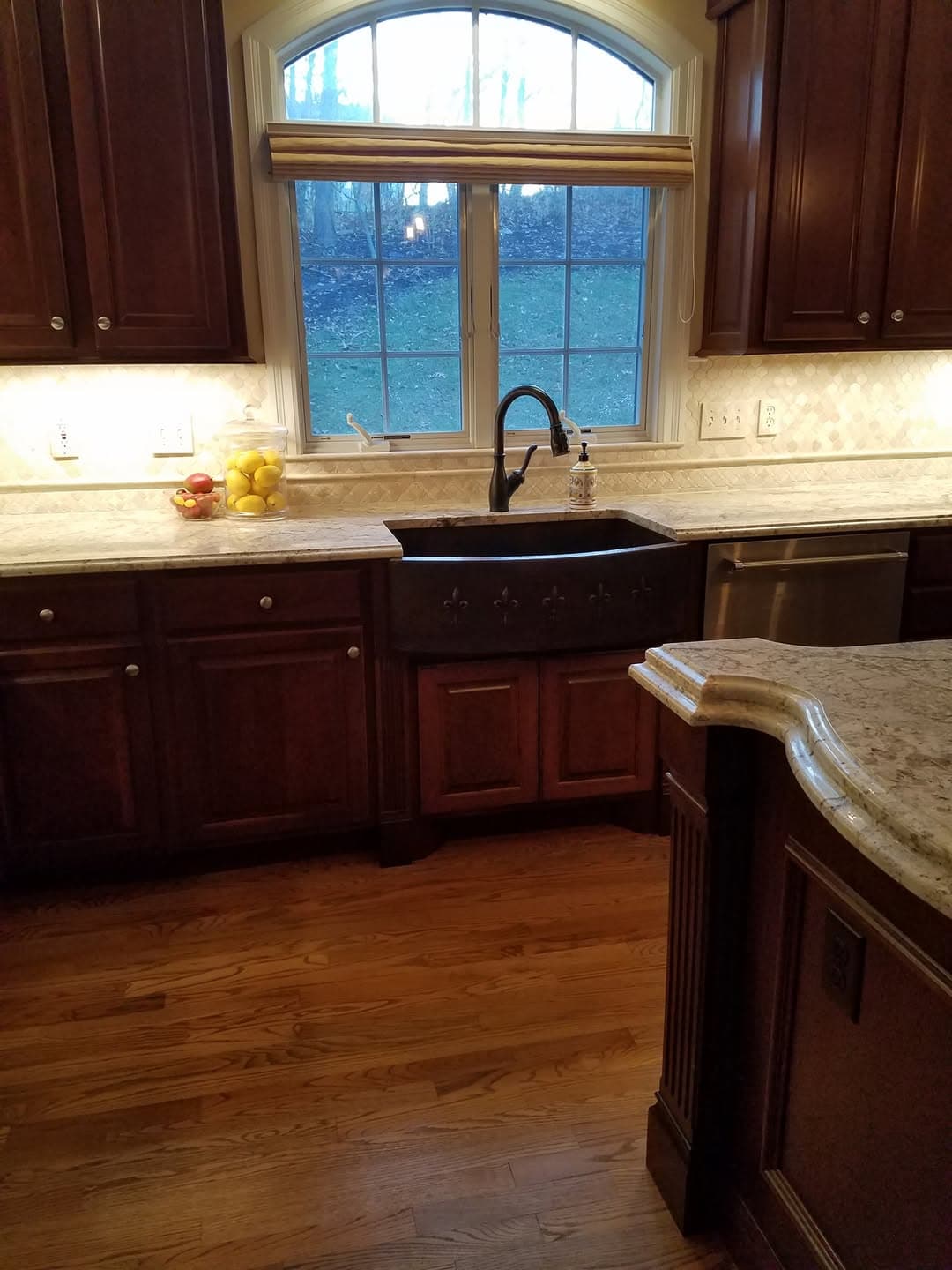 Custom cherry kitchen with stone countertops