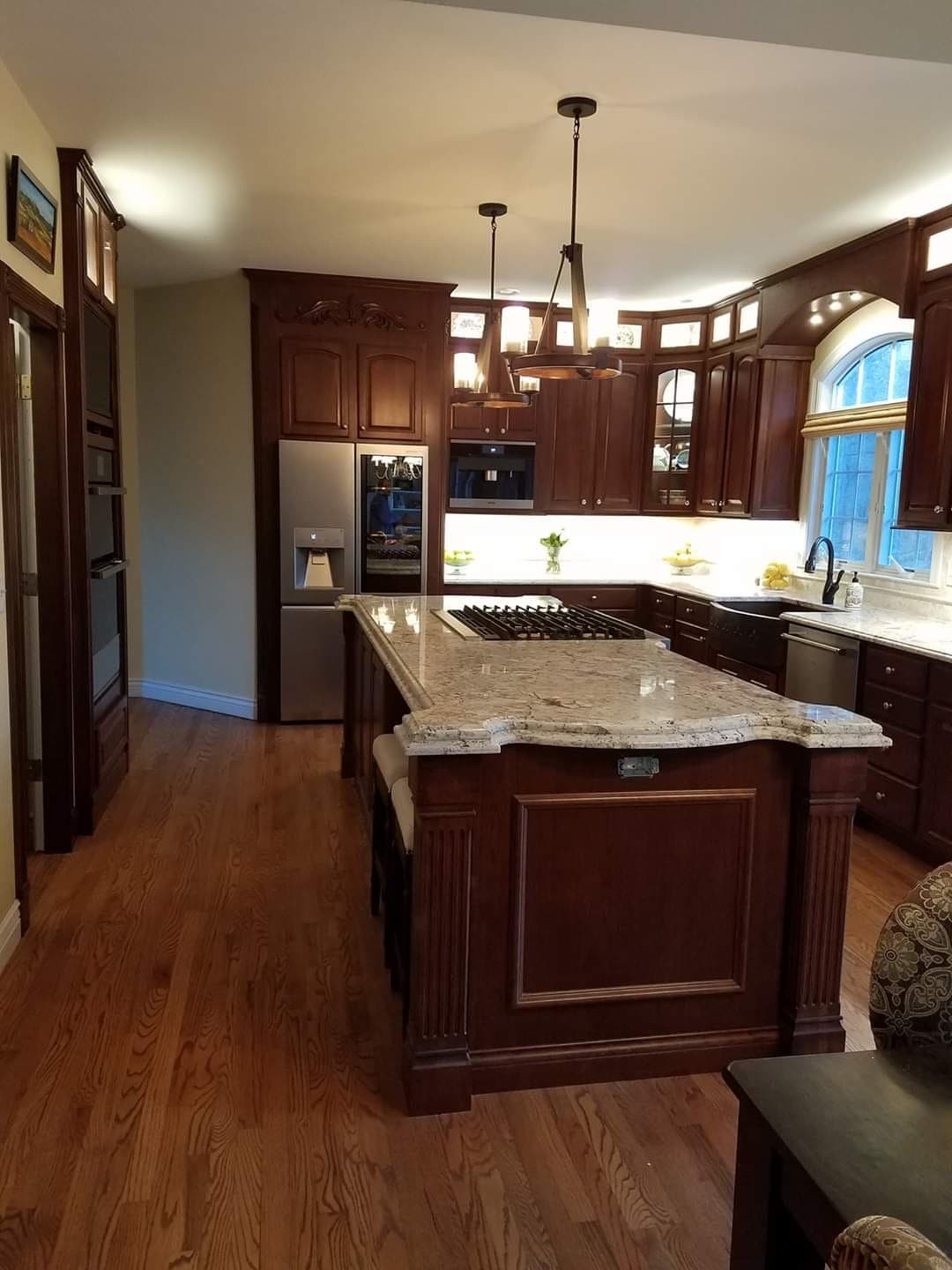 Custom cherry kitchen with decorative island
