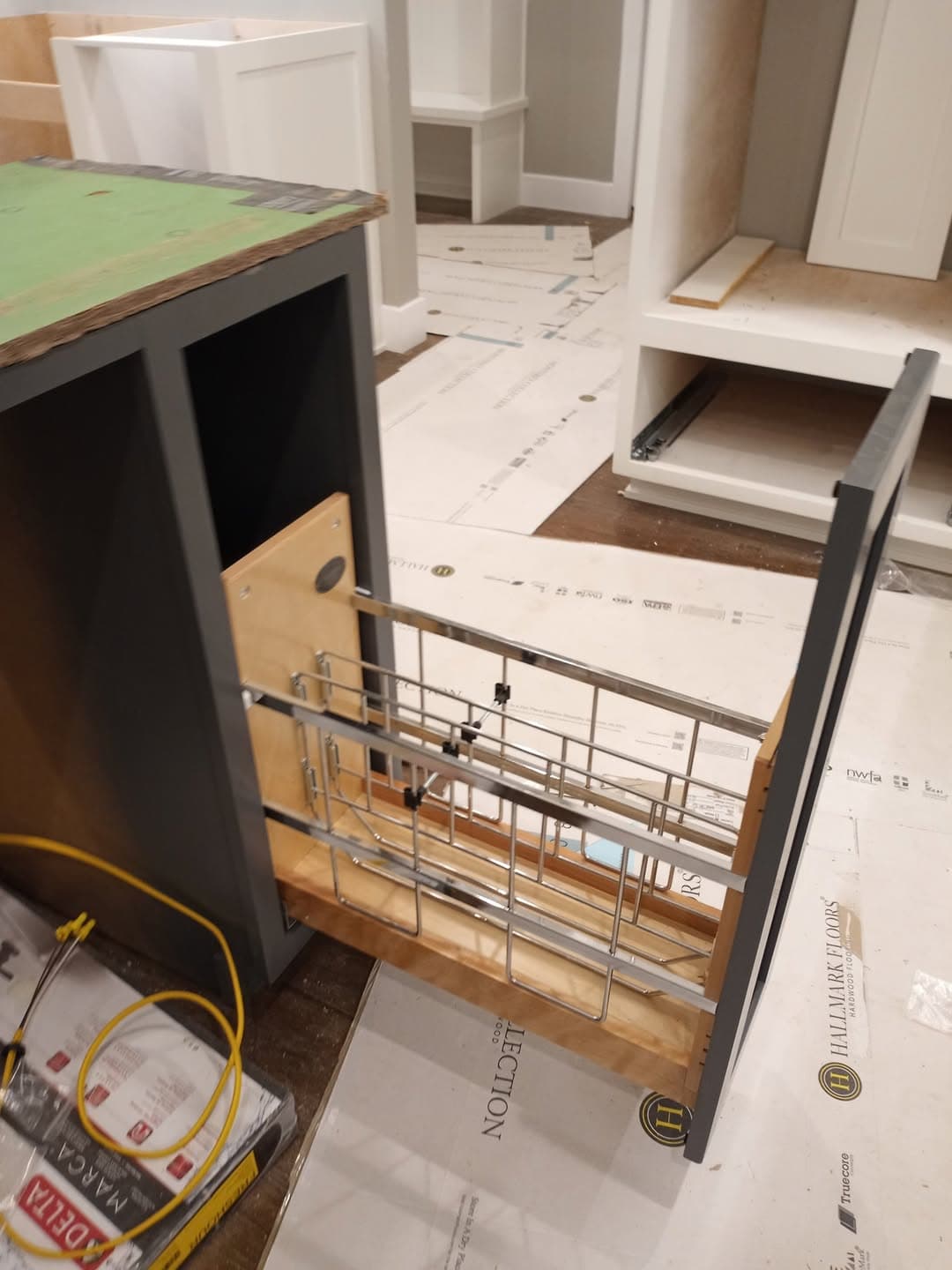 Custom corner cabinet wire storage system