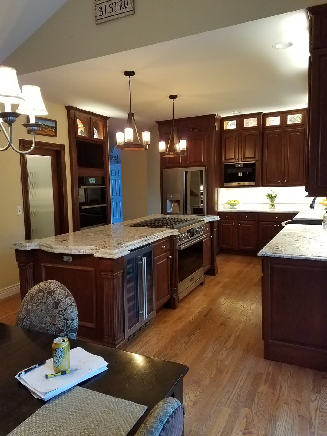 Custom cherry kitchen sink cabinetry