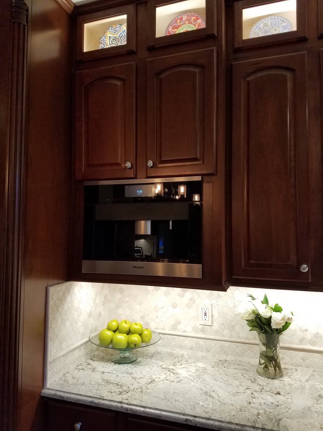 Custom cherry lower cabinets and farmhouse sink