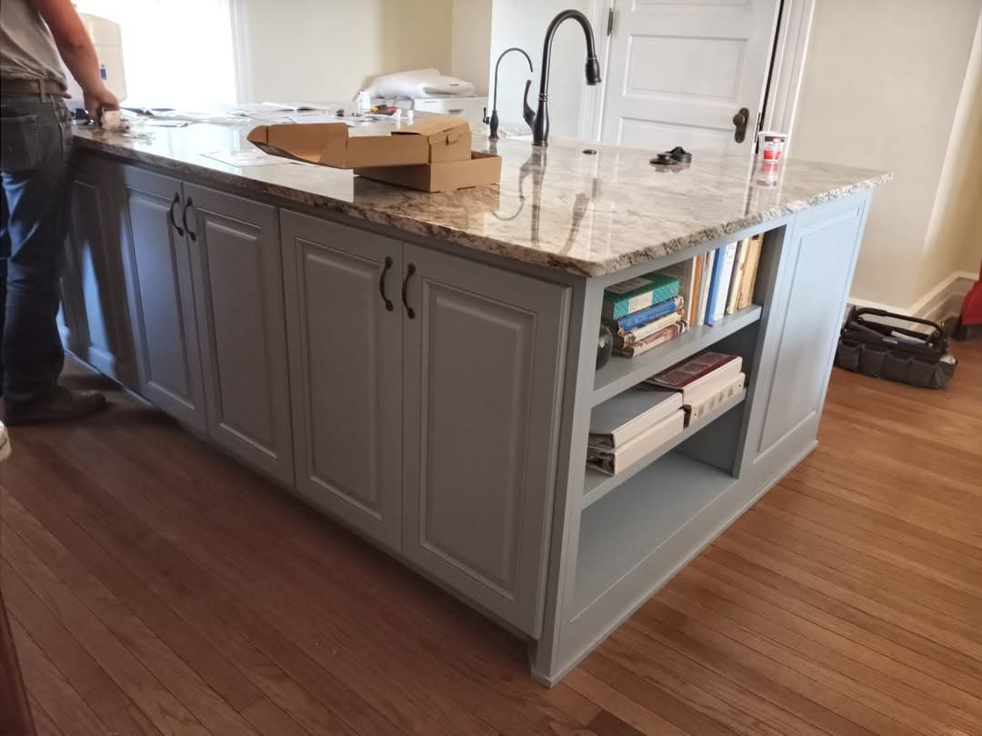 Traditional cherry display hutch with glass doors and lower storage