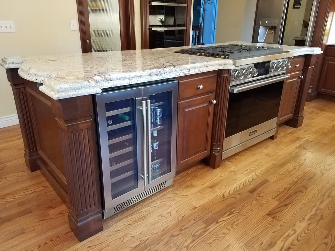 Custom cherry beverage center with wine cooler
