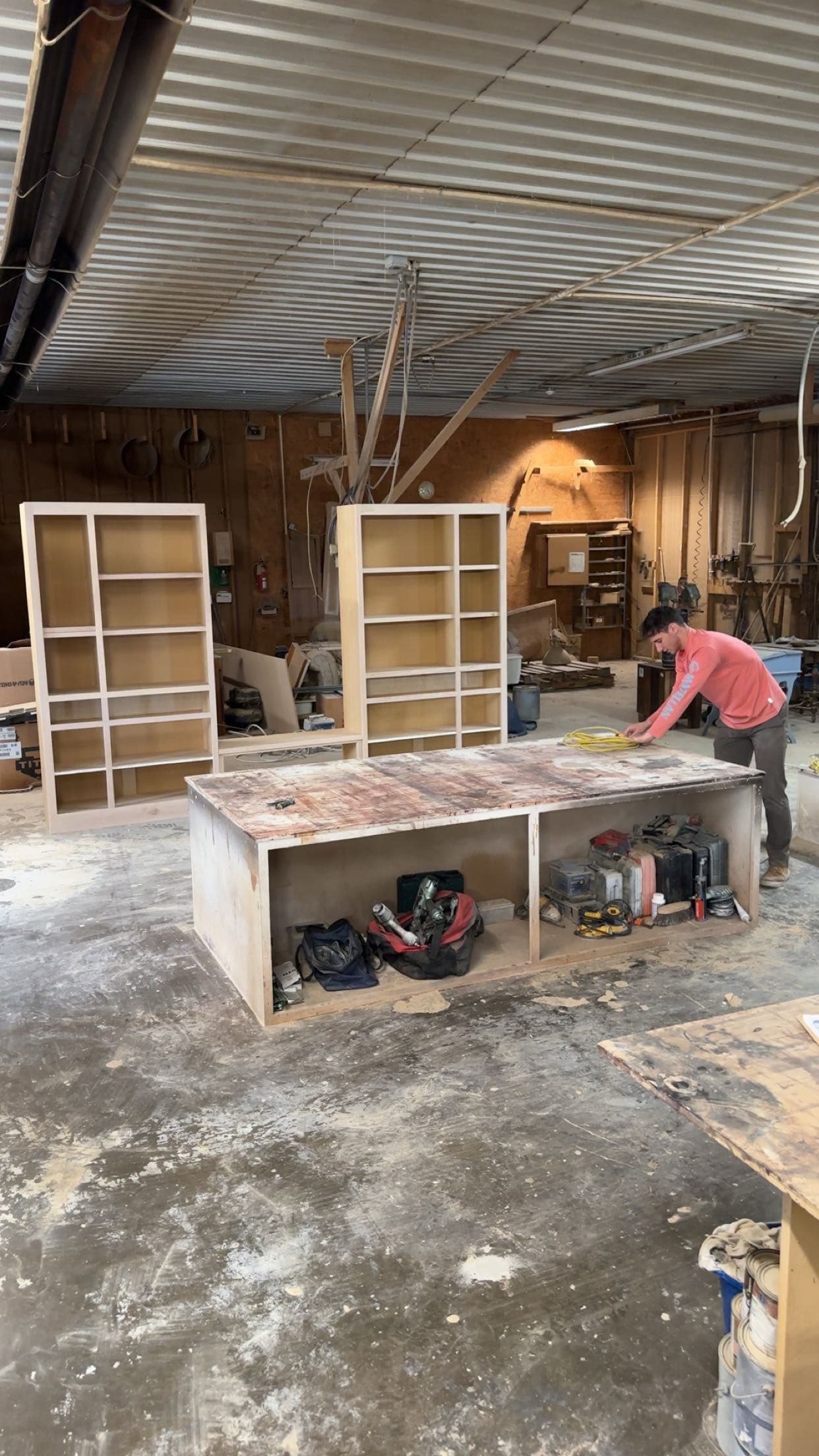 Cabinetmaker working on custom cabinetry in the workshop