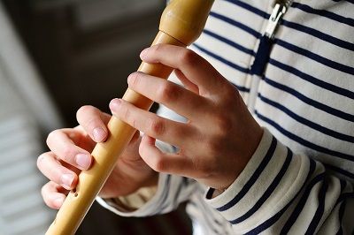 Child playing the recorder