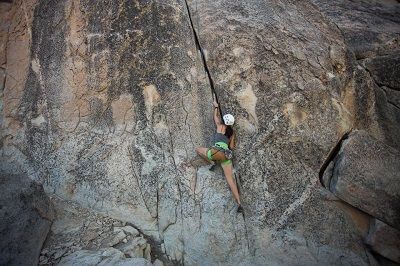 Woman rock climbing