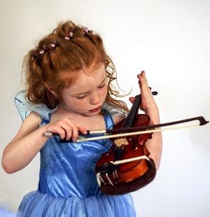 Child playing the violin