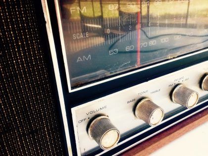 Retro-style radio with volume and tuning knobs