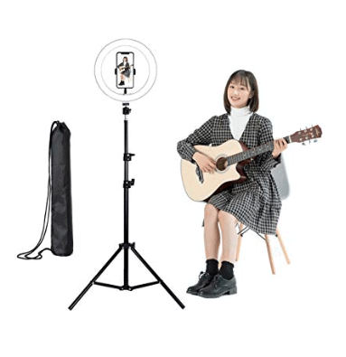 Girl performing with a guitar Yuepin 10.2 inch ring light, stand, and phone