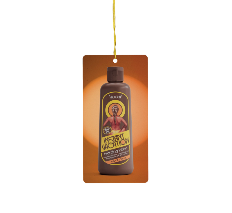an Instant Vacation® Air Freshener, front view showing packaging