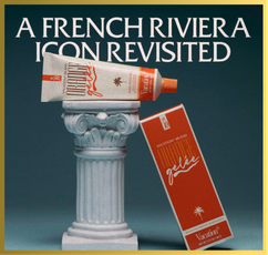 A tube of "Vacation Brand Orange Gelée" sunscreen sits on a white miniature column next to its orange box, with text "A FRENCH RIVIERA ICON REVISITED" above.