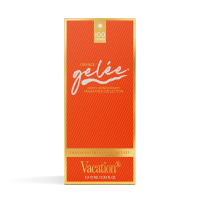 Vacation Orange Gelée 100th Anniversary fragrance set in an open orange box revealing mini bottles.
