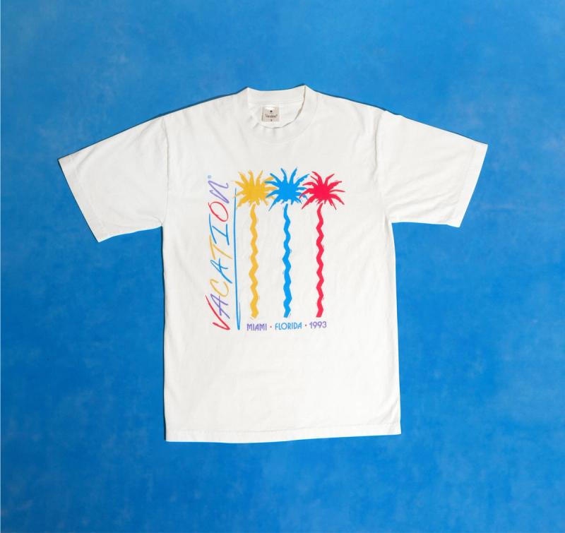 a Vacation® Jazz Palms White T-Shirt on a blue background