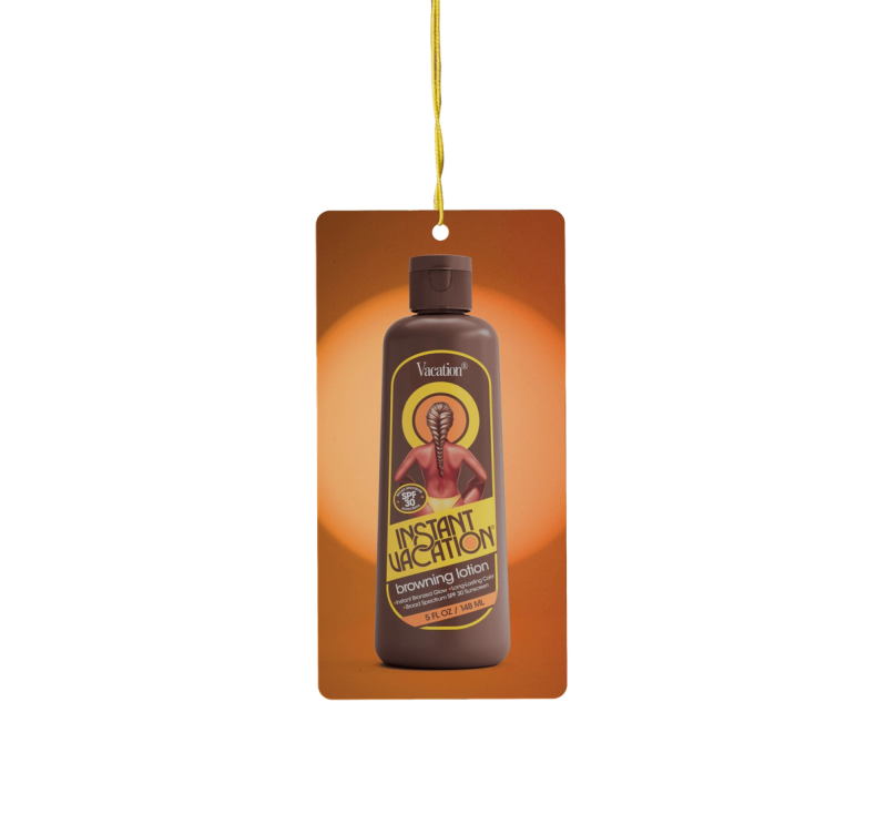 a bottle of instant vacation bronzing lotion hangs from an air freshener