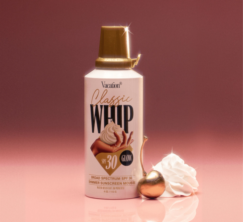 Classic Whip Glow SPF 30 on a pink background with a dollop of whip and a gold cherry