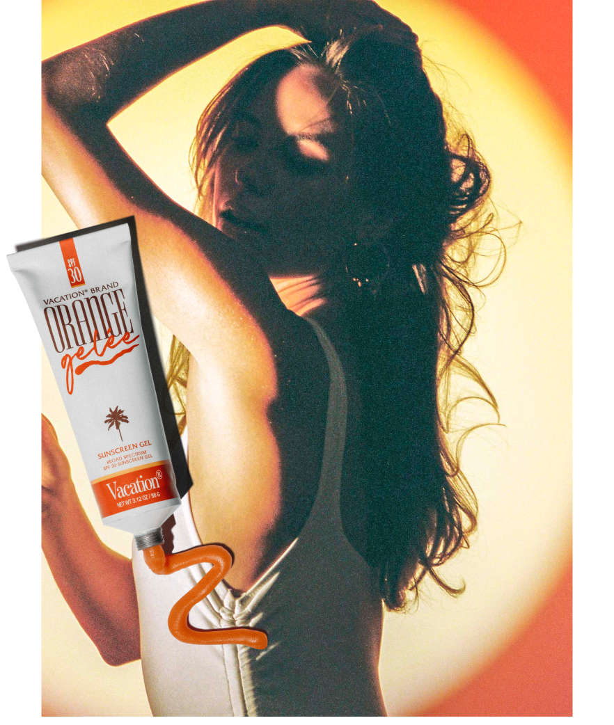 a woman is standing next to a tube of orange gelee by vacations