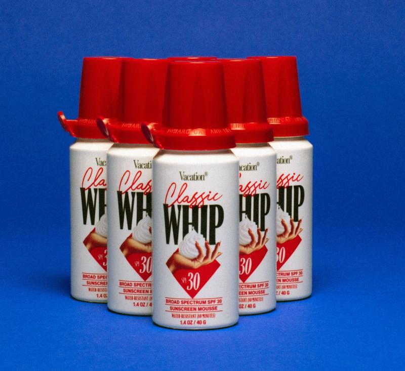 a can of Classic Whip on a red gradient background