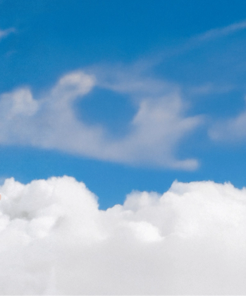 a blue sky with white clouds in it