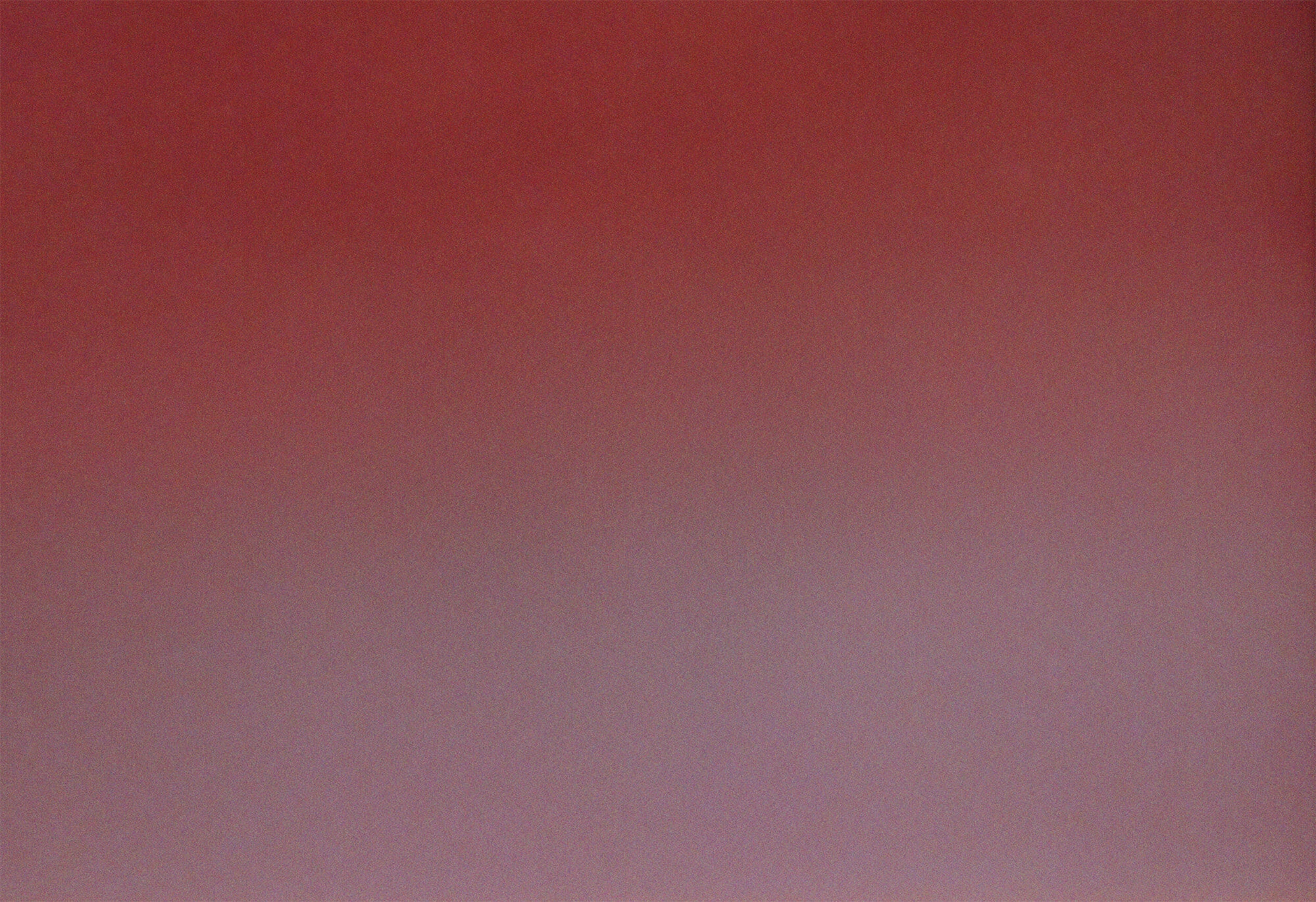 a close up of a pink gradient background