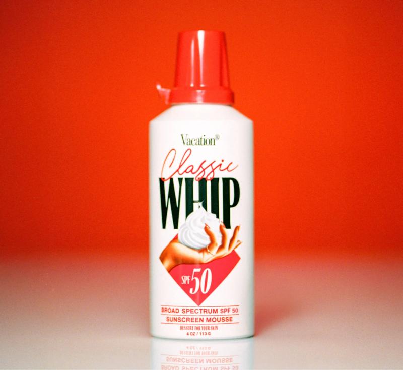 a can of Classic Whip on a red gradient background