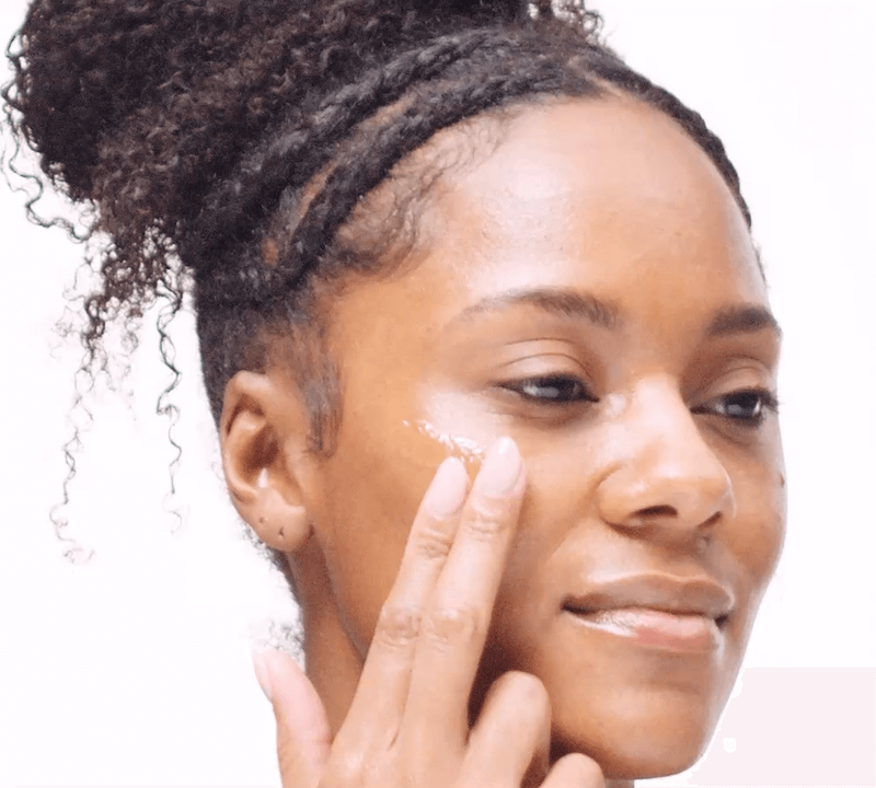 a woman applying Crystal Invisible Face Gel