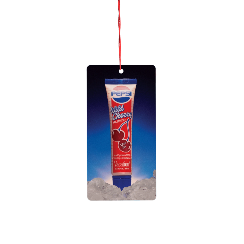 Pepsi Wild Cherry SPF 30 lip balm ornament hanging by a red string.