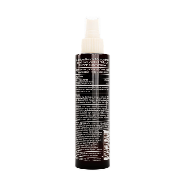 Back of a dark brown spray bottle with a white pump and a label showing product details, including SPF 30.