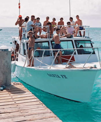 a group of people on a boat called santa fe