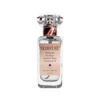 a bottle of grand cuvee scent of the luxurious vacation brand chardonnay oil