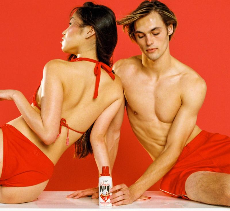 man and can of classic whip