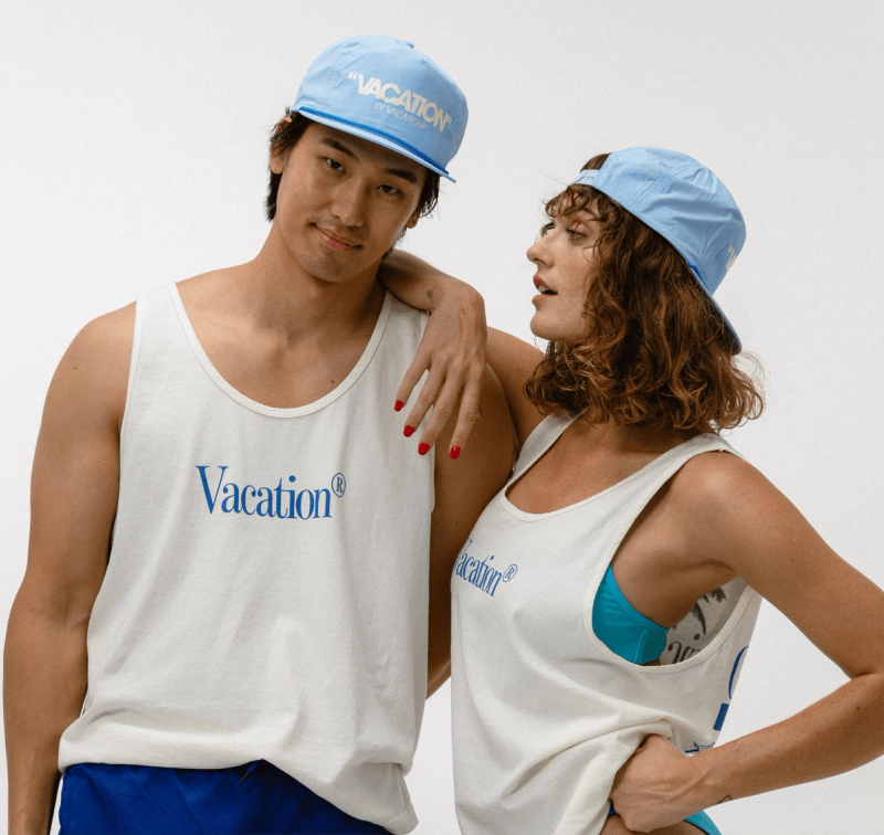a man and a woman wearing vacation tank tops