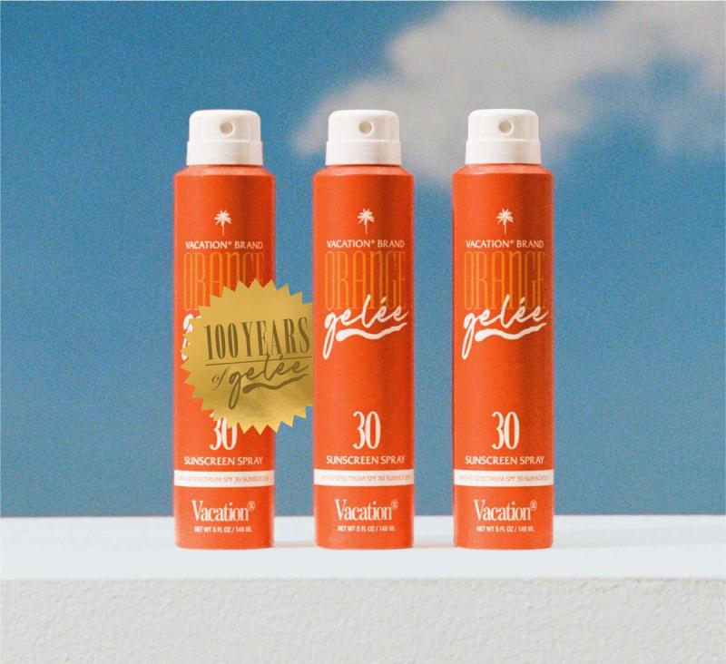 three bottles of vacation brand orange gelee sunscreen spray