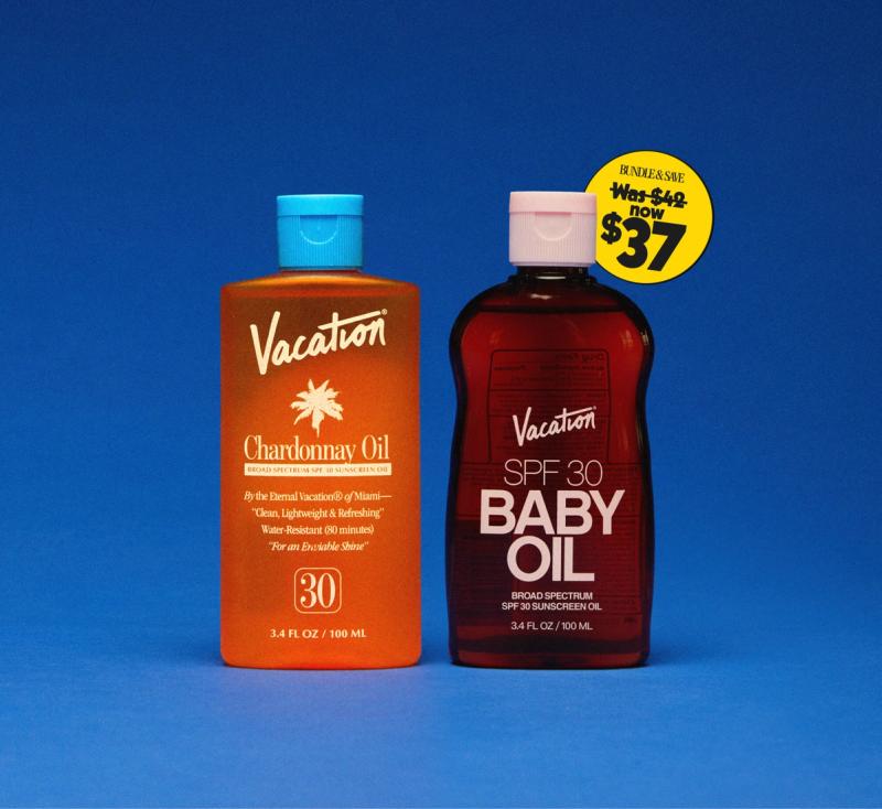 a bottle of vacation chardonnay oil and a bottle of vacation spf 30 baby oil on a blue background .