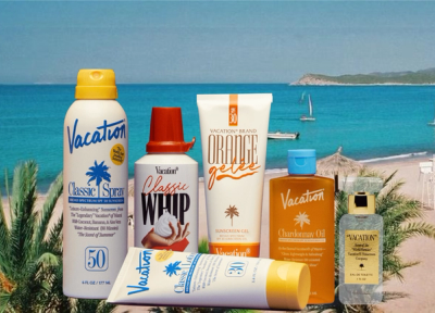 a bottle of vacation chardonnay oil sits next to a bottle of mineral lotion