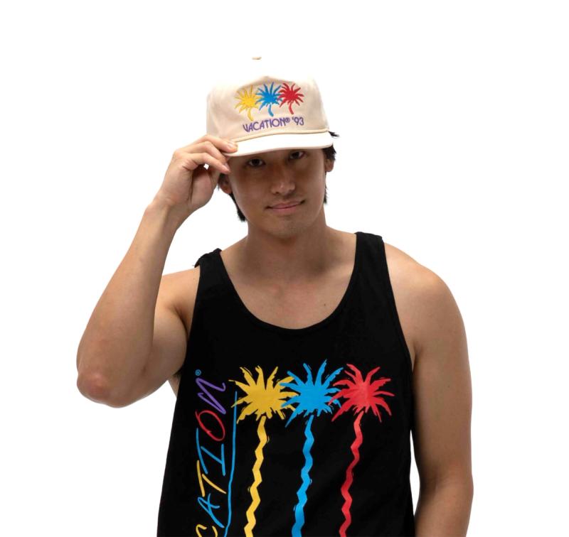 a man wearing a Vacation® Jazz Palms Rope Hat and black tank top