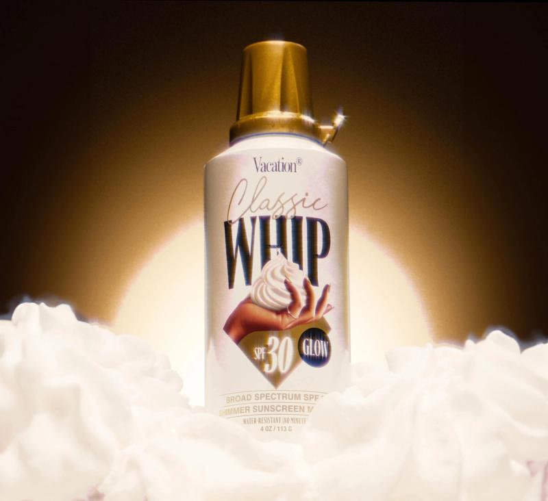 Classic Whip Glow in a gold martini glass with a gold cherry