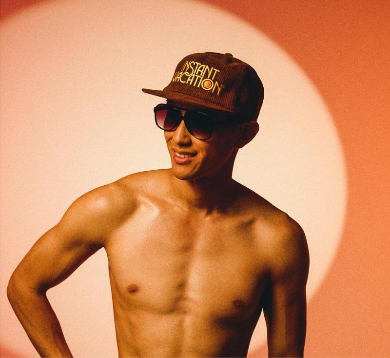a shirtless man wearing an Instant Vacation® Corduroy Hat
