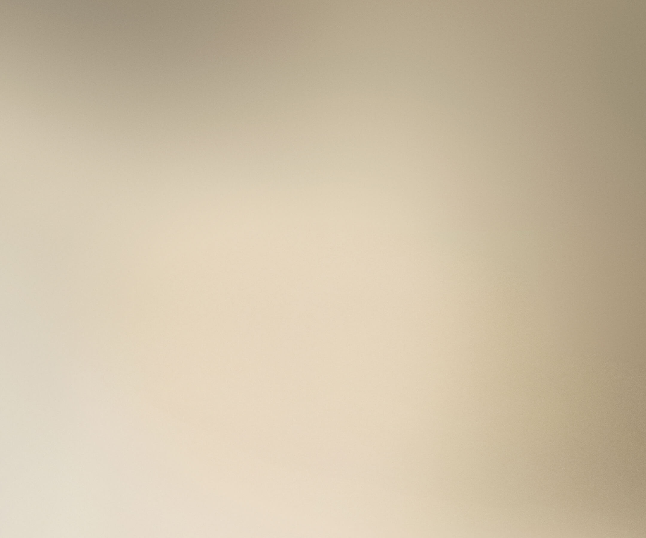 an off-white studio backdrop