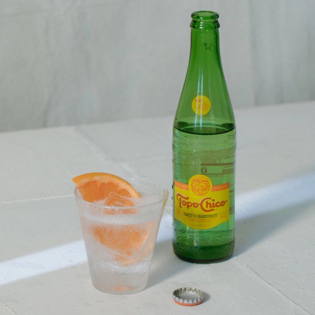 Rosaluna Topo Chico cocktail with grapefruit garnish