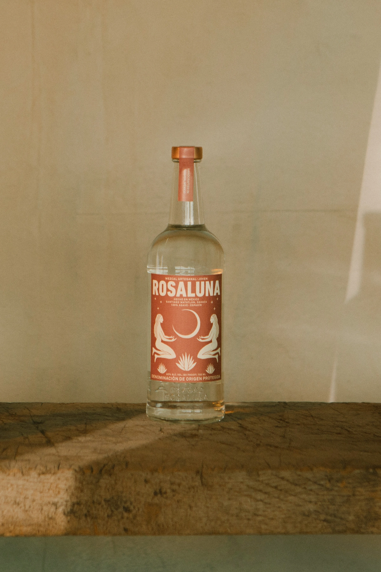 Still life of Rosaluna Mezcal bottle