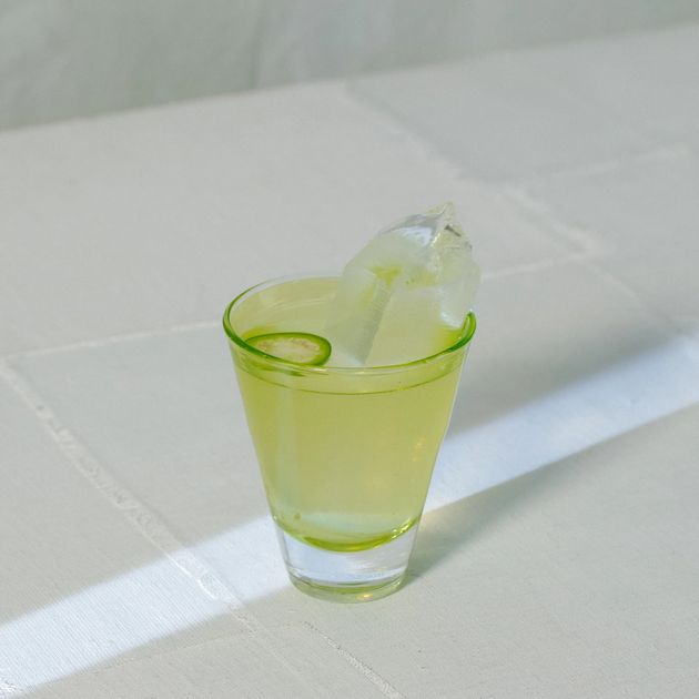 Rosaluna skyrocket cocktail with jalapeño garnish