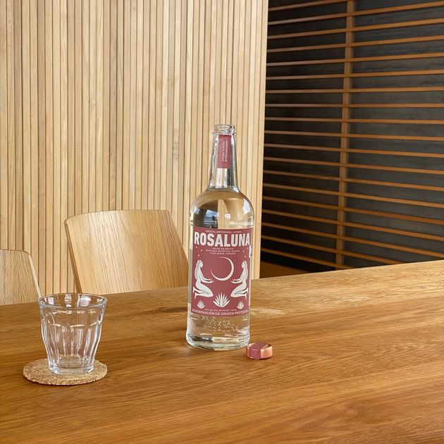 A glass at a prepared table