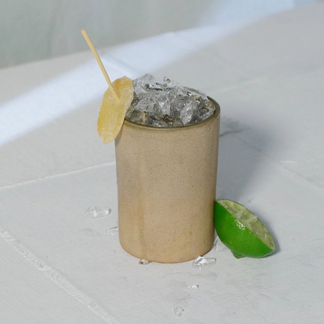 Rosaluna Mezcal Mule with candied ginger and lime garnish