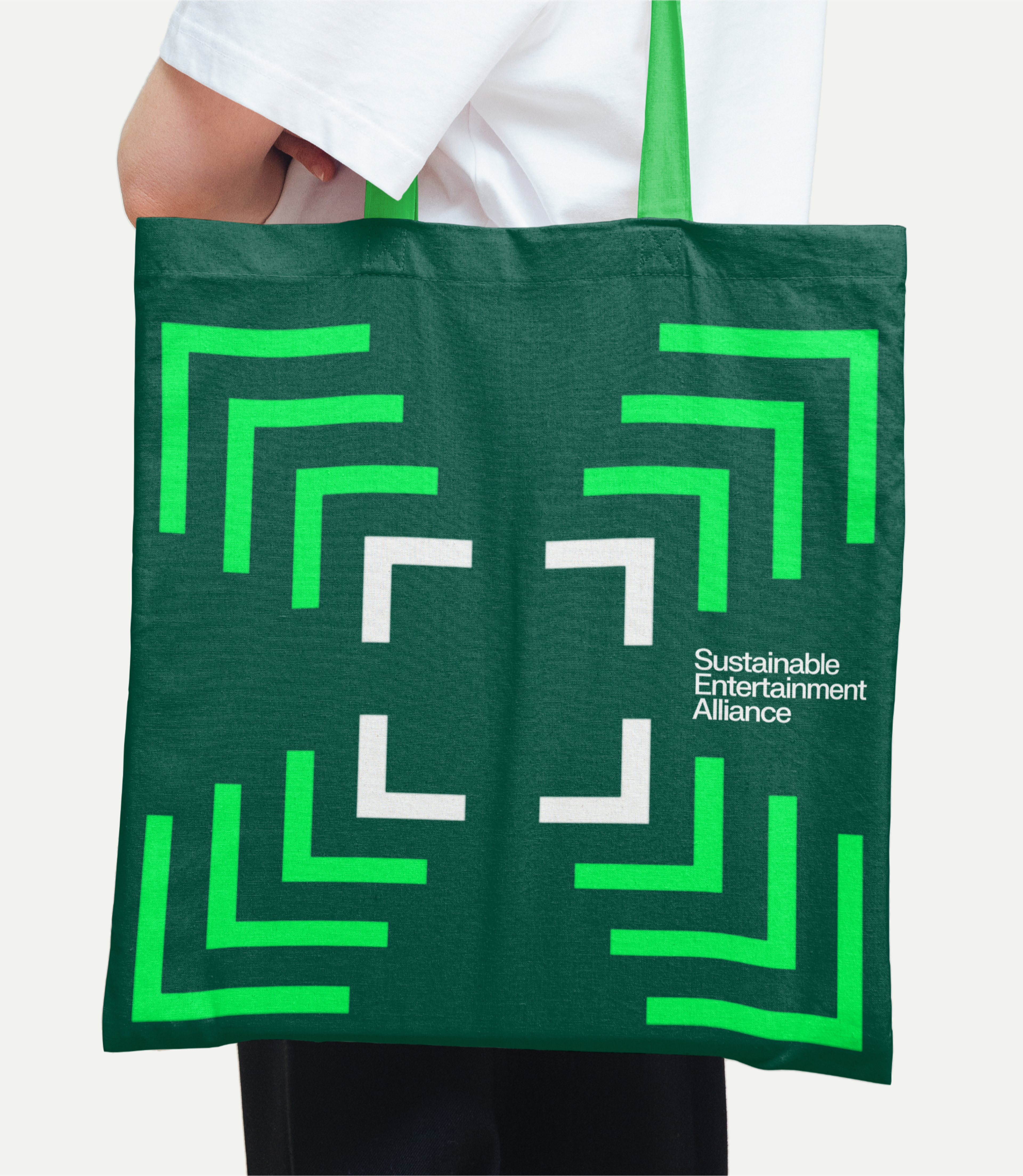 Tote bag with the Sustainable Entertainment Alliance logo on it. Copyright Cotton Design, Talia Cotton