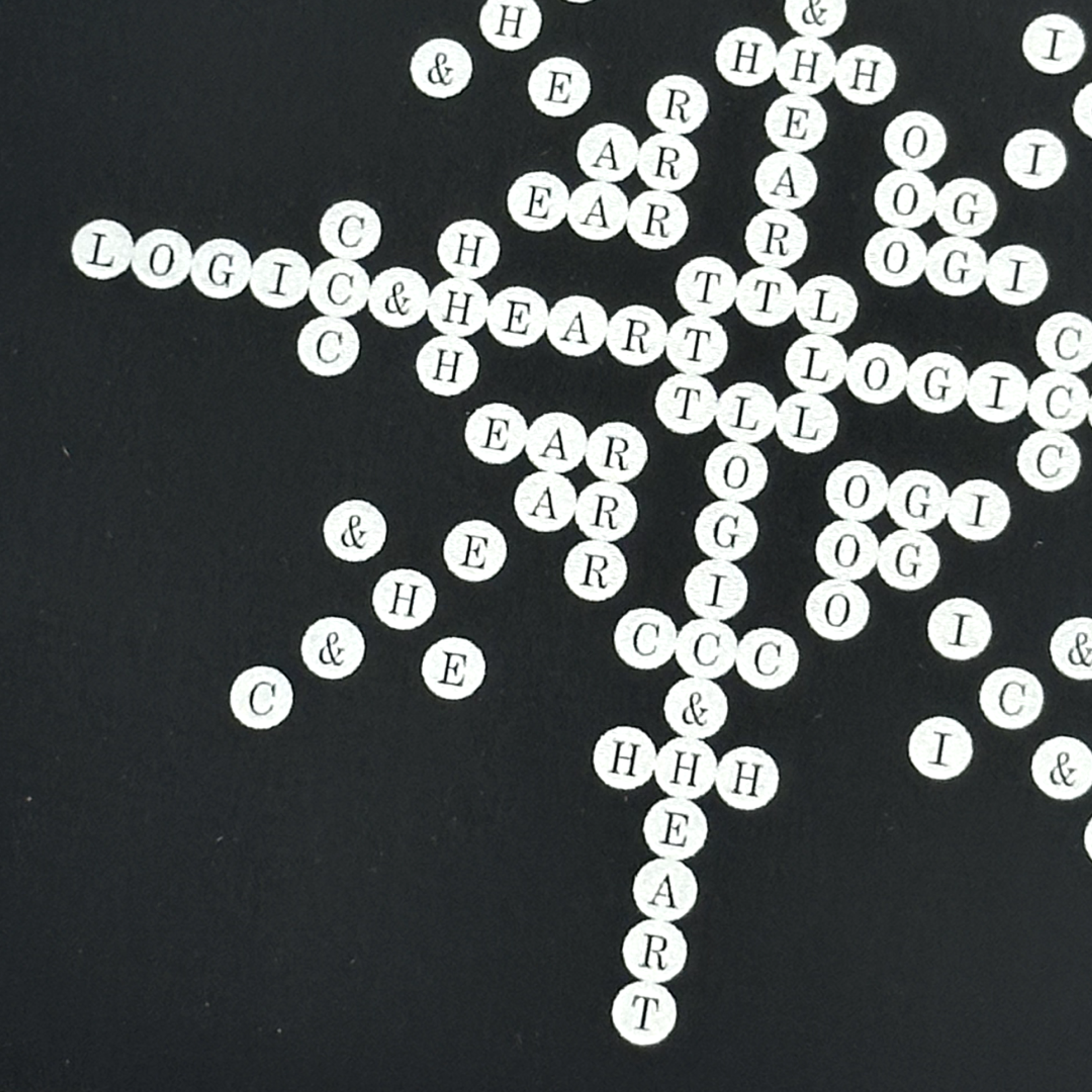 white circles with letters in them. Copyright Cotton Design, Talia Cotton
