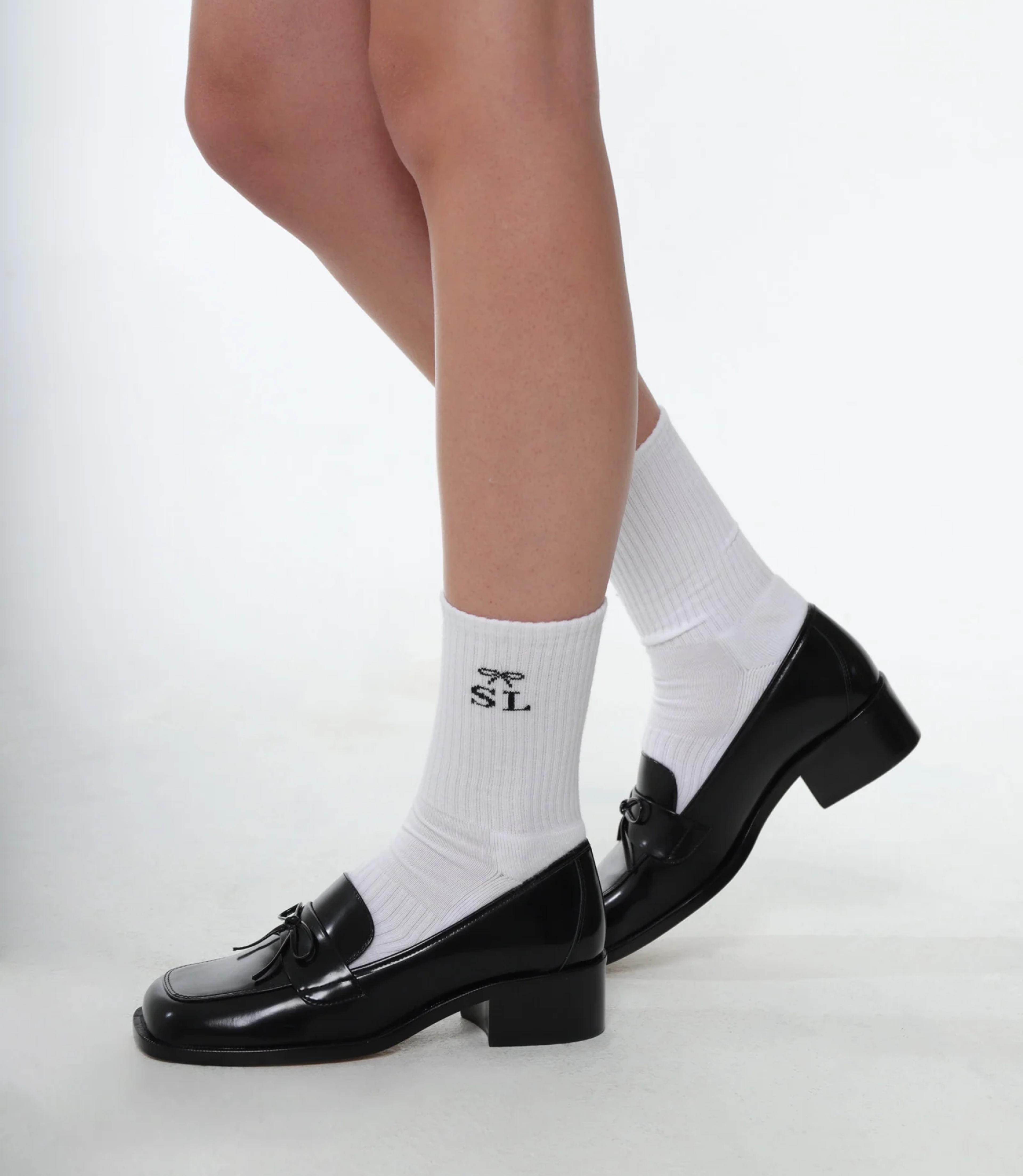 Sandy Liang socks with "SL" Acronym. Copyright Cotton Design, Talia Cotton