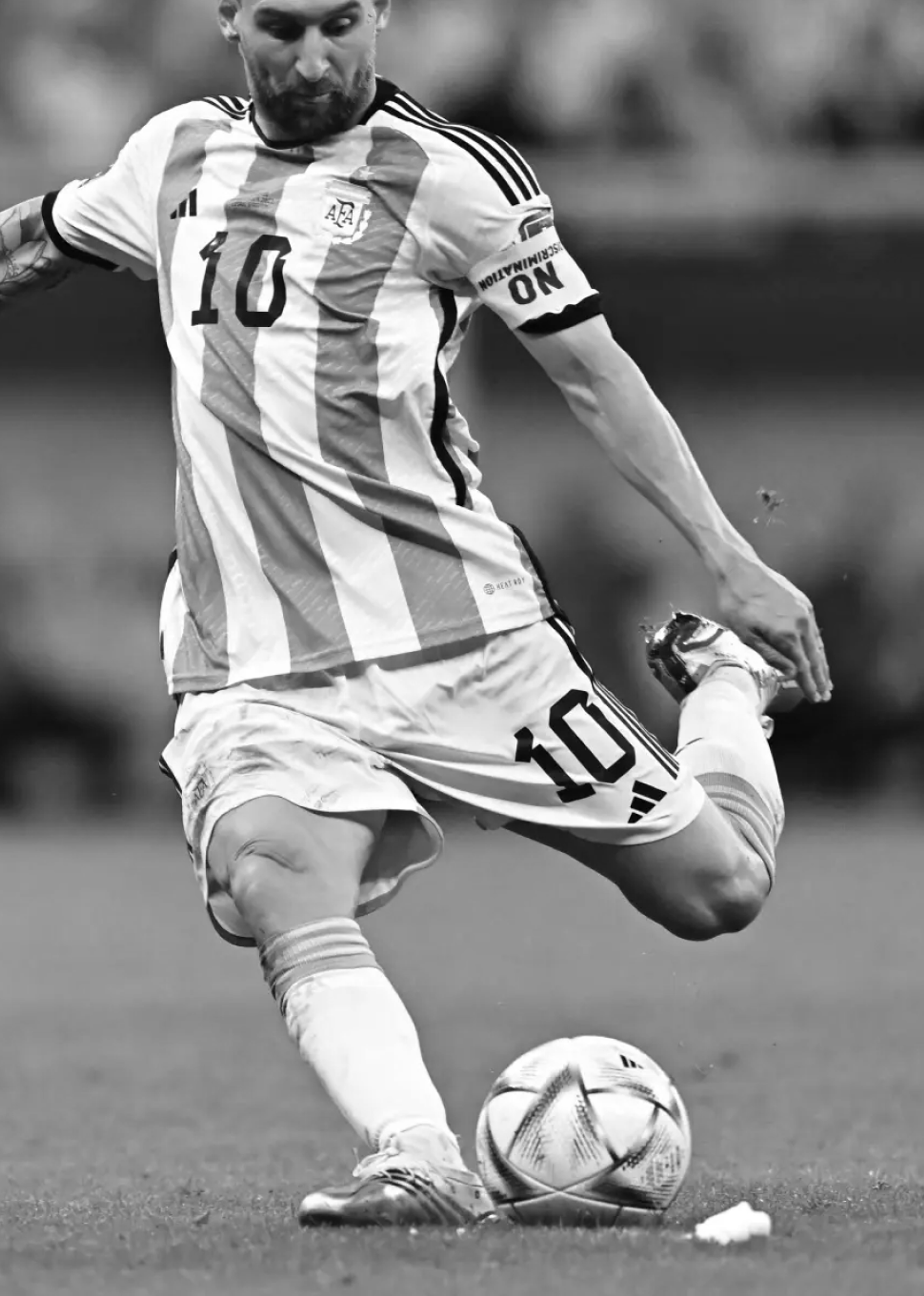 Messi kicking ball, black and white.. Copyright Cotton Design, Talia Cotton