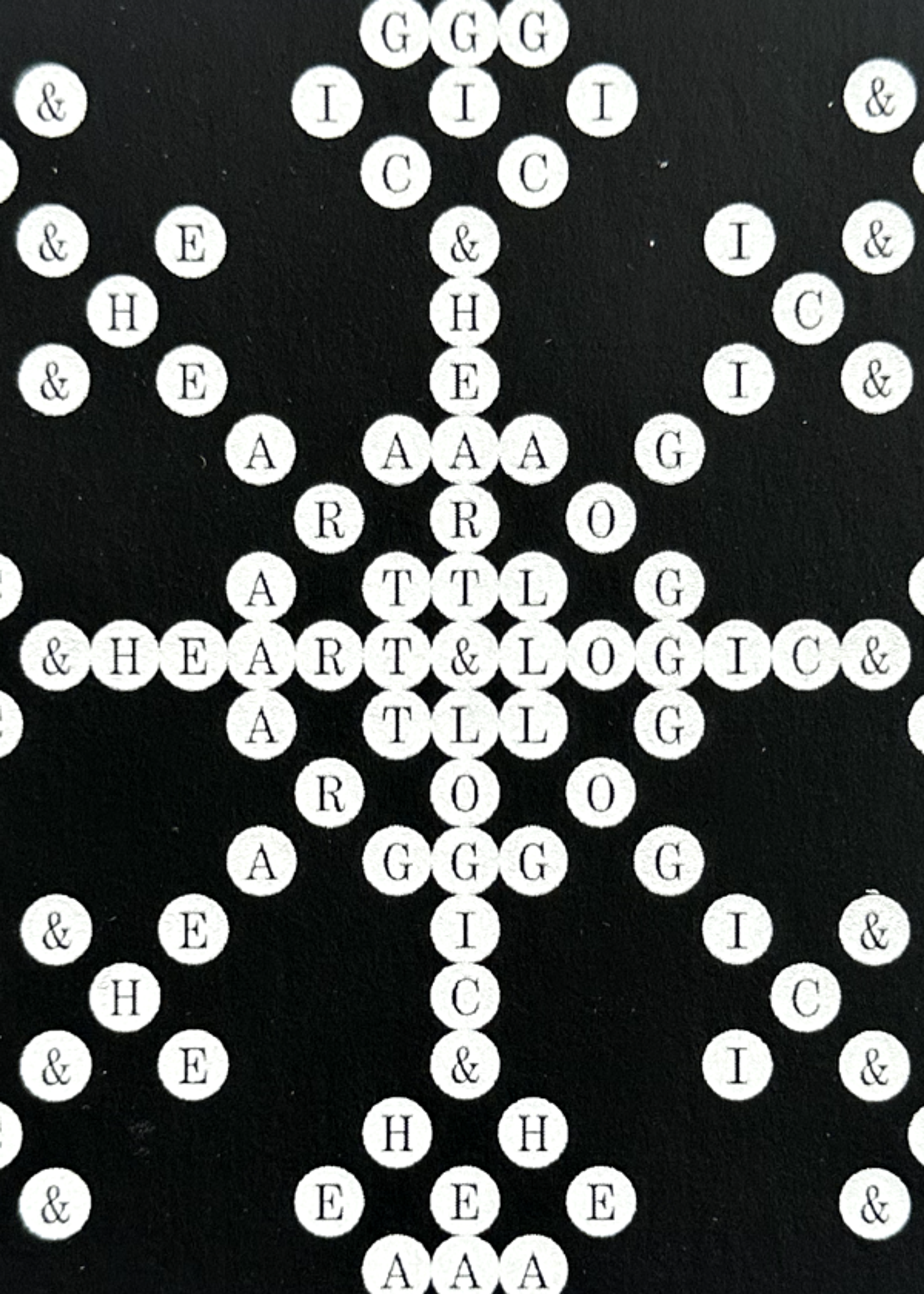 white circles with letters in them. Copyright Cotton Design, Talia Cotton
