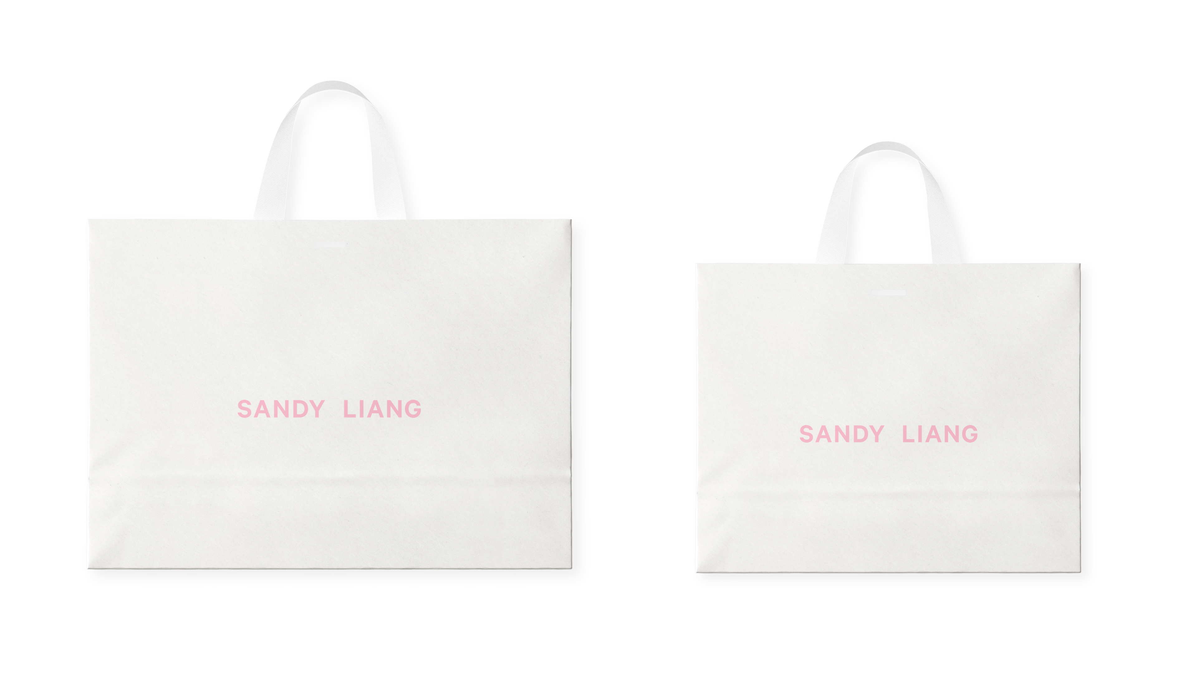 Two Sandy Liang white bags large and small on a white background. Copyright Cotton Design, Talia Cotton